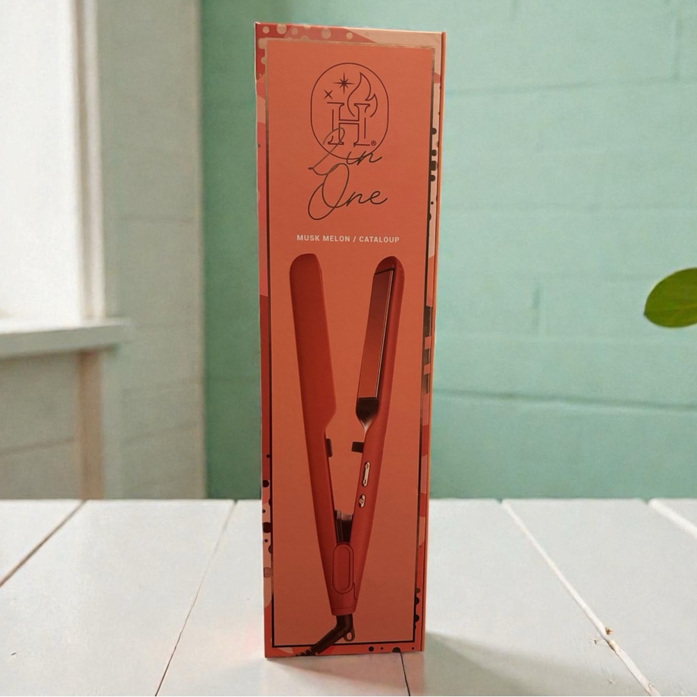 Hauteness 2 in 1 flat & curling iron in one. Retails for over $100
